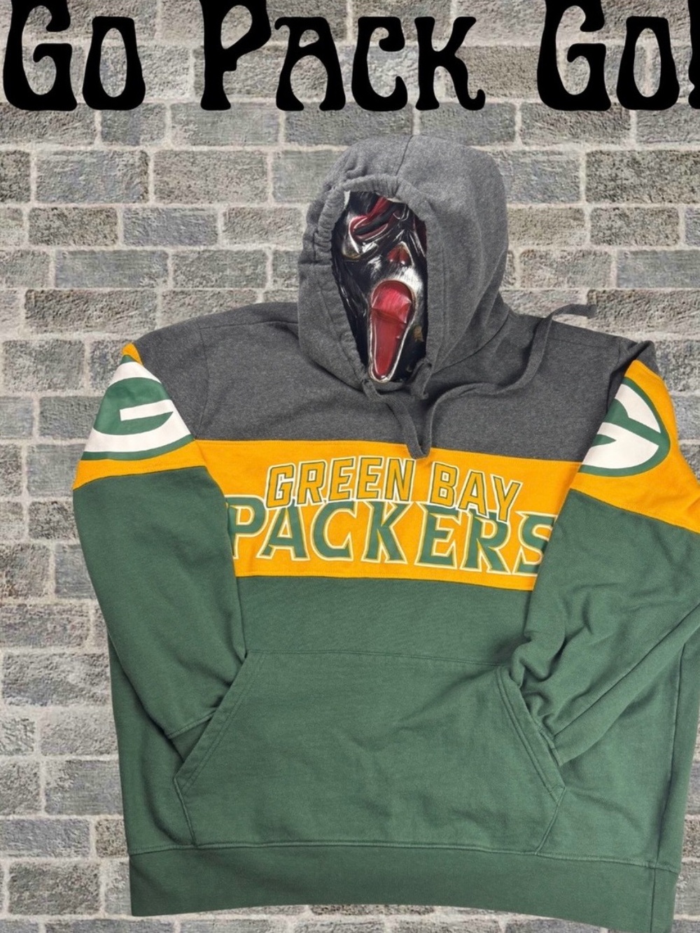 a vintage Starter NFL Green Bay Packers hoodie